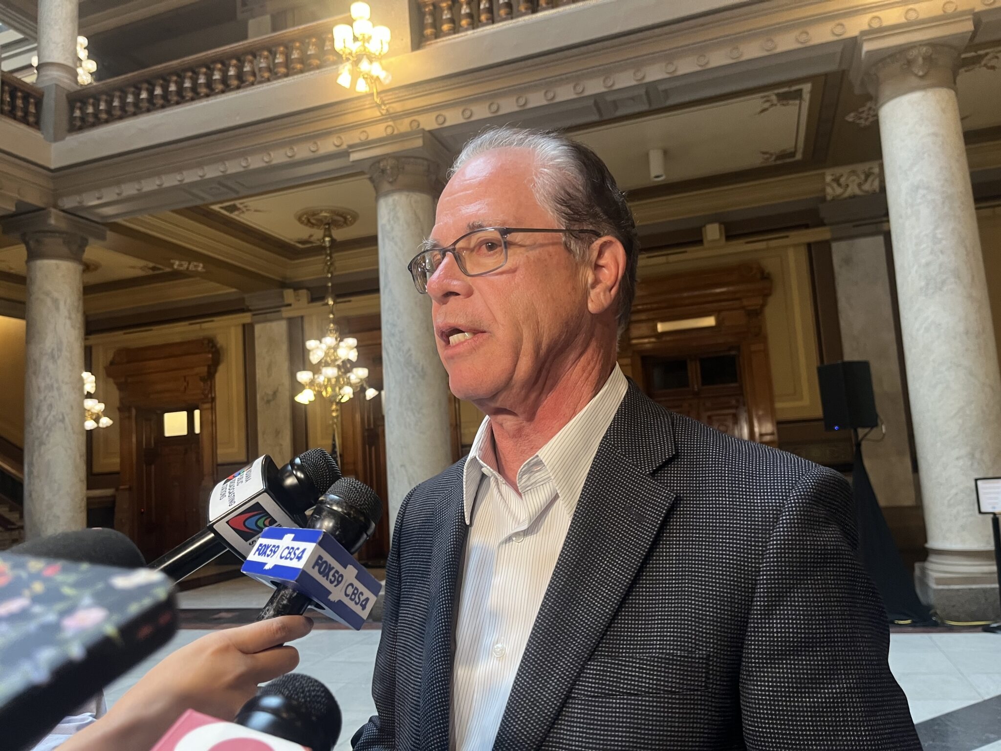 Indiana Gov. Mike Braun was careful in his comments Tuesday about potential redistricting in Indiana to net a GOP seat — or two — in Congress. (Photo by Whitney Downard/Indiana Capital Chronicle)