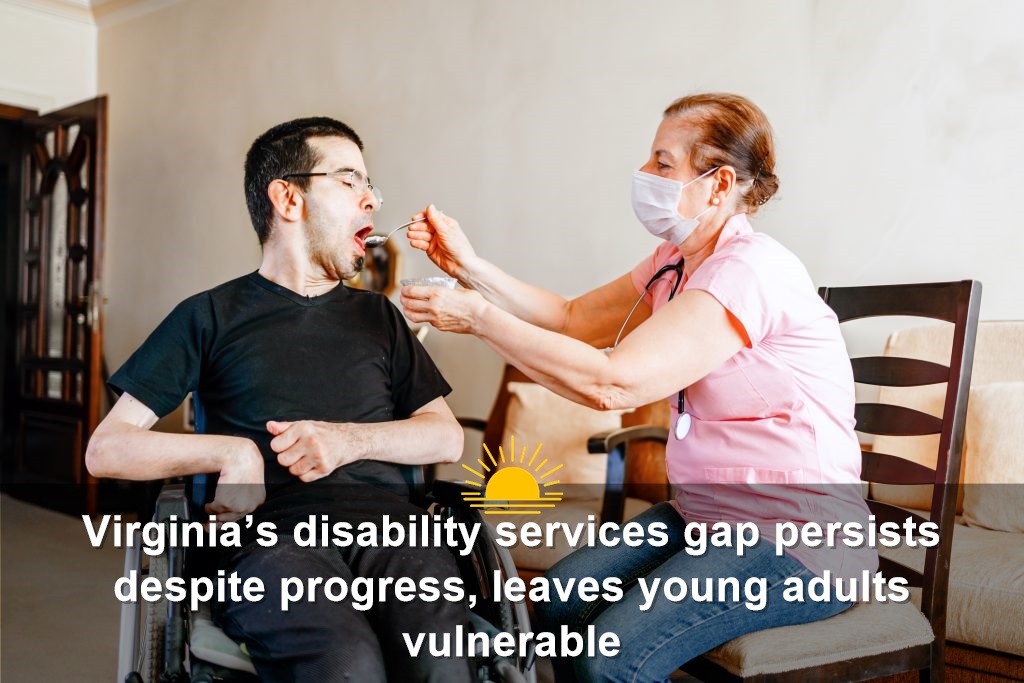 A caregiver feeds a disabled man in a wheelchair. (Photo by Getty Images)