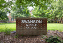 Police say student who made threats was armed with knives at school