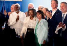 At a Vienna rally, Republican nominees Winsome Earle Sears decry their’ socialist opponents’