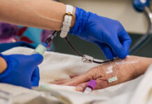 ER visits by uninsured patients in Virginia hospitals spiked by 8% last year A physician administering care. (Photo by Brandon Bell/Getty Images)
