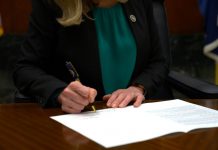 Virginia governor signs Dominion-backed bills. All eyes on regulators now.