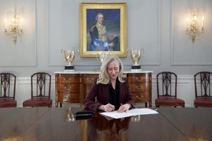 Gov. Abigail Spanberger signs legislation in Richmond in April. Spanberger’s first six months in office have been marked by clashes over vetoes, affordability policies and ongoing budget negotiations tied to data center tax incentives. (Photo courtesy of the Virginia Governor's Office)