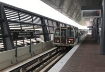 Lawmakers weigh merging Northern Virginia transit agencies to cut costs A Metro railcar pulls up to the Dulles International Airport Metro Station. (Photo by Tim Walck/Dulles Corridor Metrorail Project)