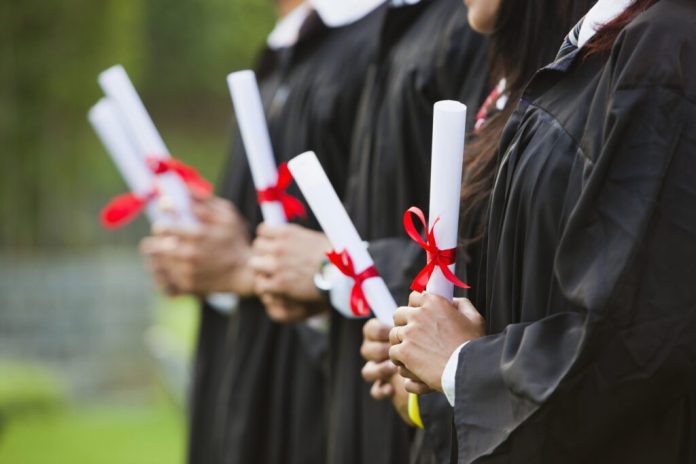A group of college graduates. (Photo by Getty Images)