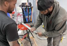Testing service acquisition expands Virginia’s workforce credentialing and policy plans Students enrolled at IBEW Local 666's Apprenticeship Program learn how to bend and install electric conduit. (Courtesy of IBEW Local 666)