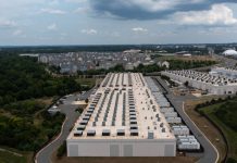 PJM gets green light to push data centers onto back-up power during heat wave An aerial view shows an Amazon data center in Ashburn, Virginia. PJM Interconnection got the OK from the U.S. Department of Energy to require data centers to turn on back-up generators during this week’s heatwave. (Photo by Nathan Howard/Getty Images)